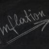 the word inflation with an arrow upwards