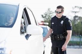 police officer approaching a vehicle